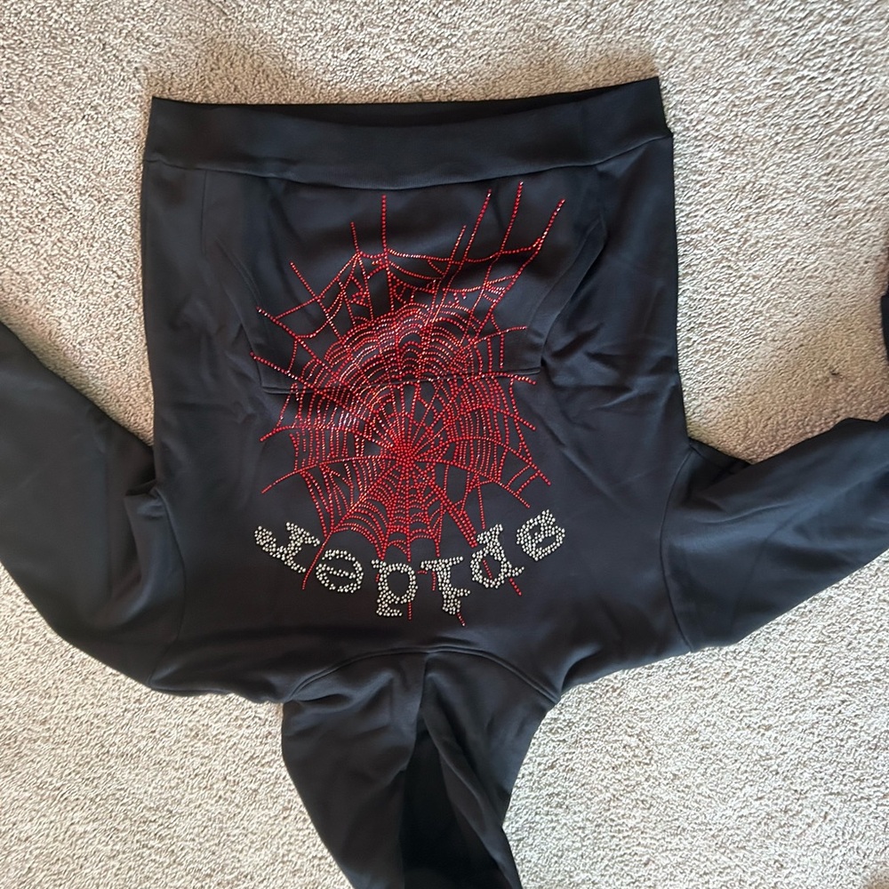 Red rhinestone sp5der hoodie in great condition very comfortable.